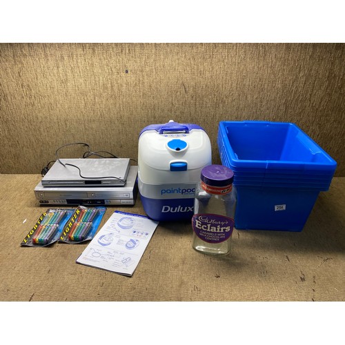 256 - Mixed items including VHS/DVD combination, Dulux paint pod system.