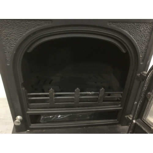 11 - Clarke Richmond cast iron log burner with flue top (unused)