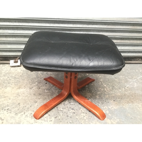 19 - Leather topped footstool with four legged base