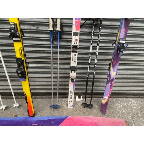 4 - 3 sets of skis with bags, including Kastle.