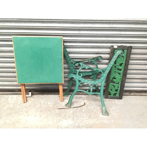 27 - Cast iron chair ends and back plus a vintage card table