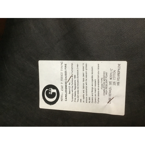 59 - Four G Plan dining chairs with green padded seats