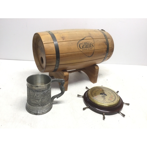 204 - Grants Scotch whiskey bottle holder in shape of a barrel, pewter tankard and a barometer