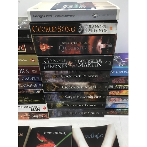 301 - Paperback books including Twilight series by Stephanie Meyer and Some James Patterson