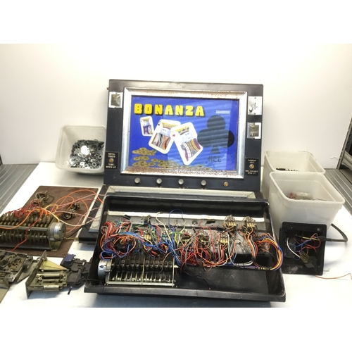 395 - A quantity of vintage arcade machine parts including a front from a Bonanze 2p machine