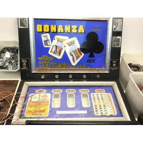 395 - A quantity of vintage arcade machine parts including a front from a Bonanze 2p machine