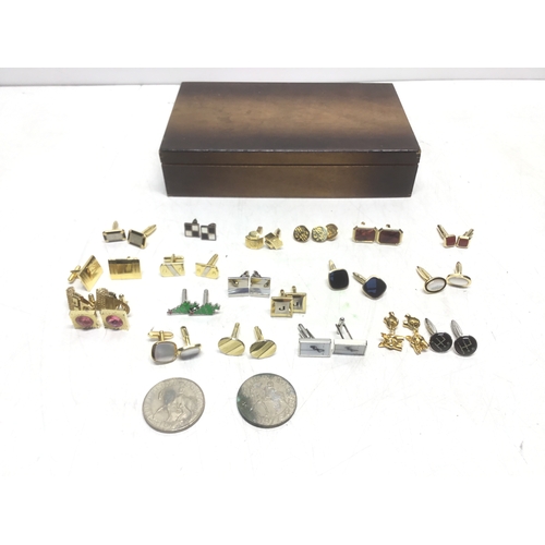 641 - A selection of quality cufflinks and two commemorative coins