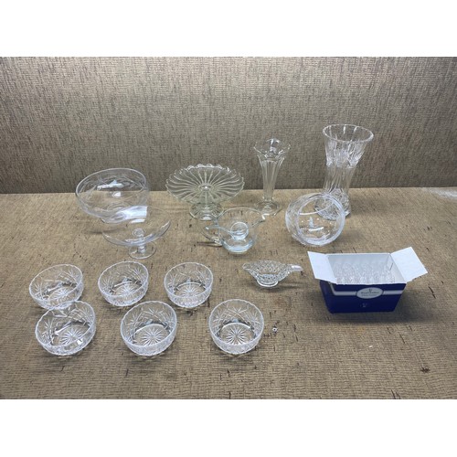 651 - A quantity of cut crystal items including vases, sweet bowl and Royal Doulton coasters
