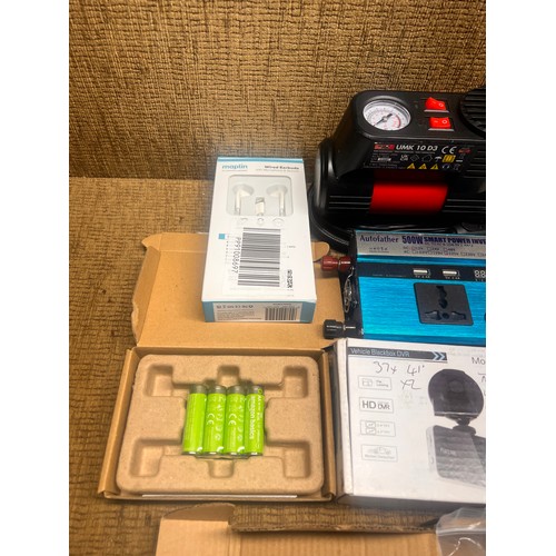 5 - Motopower MP69033 OBD2 Scanner, power inverter, batteries, and wireless headphones.