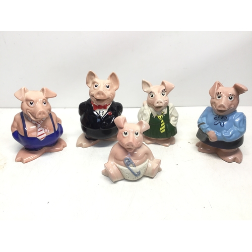 801 - A collection of five Wade NatWest piggy banks