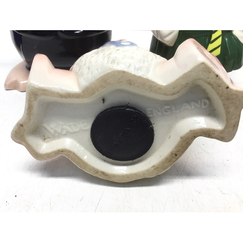 801 - A collection of five Wade NatWest piggy banks