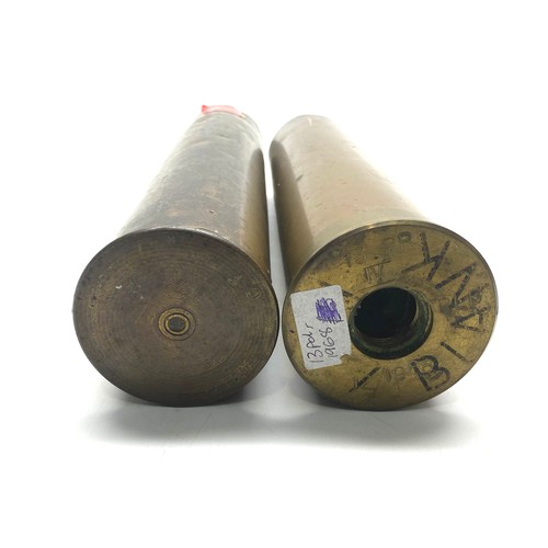 811 - 2 shell casings, including A 1968 13 Pounder and an AM.LOT 75mm