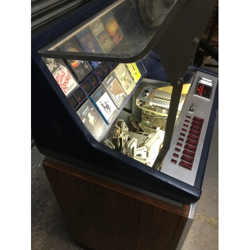 1405A - Wurlitzer C110 Cassette Jukebox, Germany Circa 1970’s comes with tapes lights up and plays