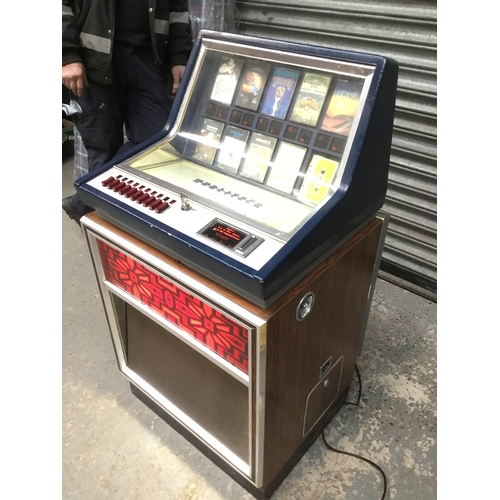 1405A - Wurlitzer C110 Cassette Jukebox, Germany Circa 1970’s comes with tapes lights up and plays