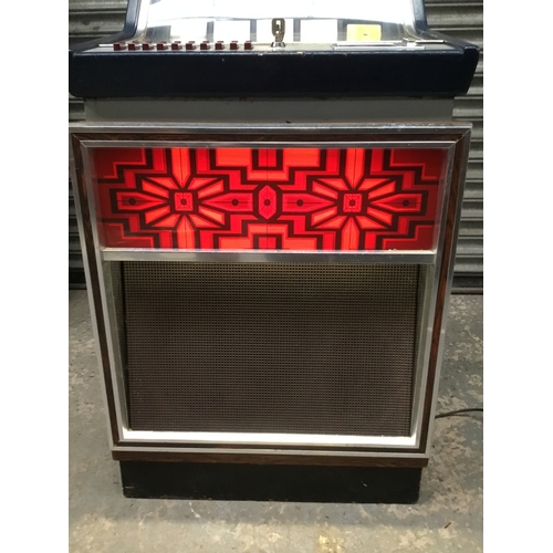 1405A - Wurlitzer C110 Cassette Jukebox, Germany Circa 1970’s comes with tapes lights up and plays