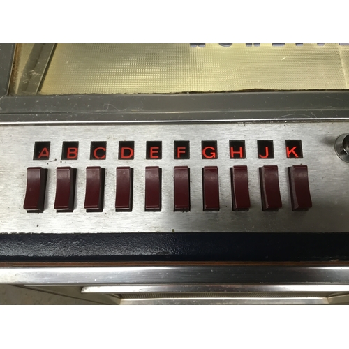 1405A - Wurlitzer C110 Cassette Jukebox, Germany Circa 1970’s comes with tapes lights up and plays