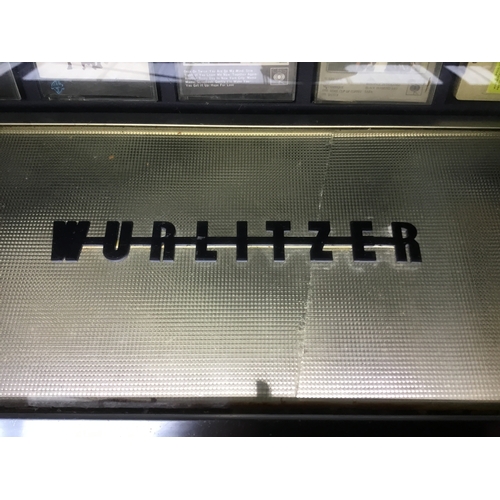 1405A - Wurlitzer C110 Cassette Jukebox, Germany Circa 1970’s comes with tapes lights up and plays