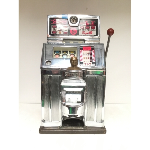 1405B - The Governor one armed bandit by Jennings with slot for 5p and featuring a brass Indian head chief o... 