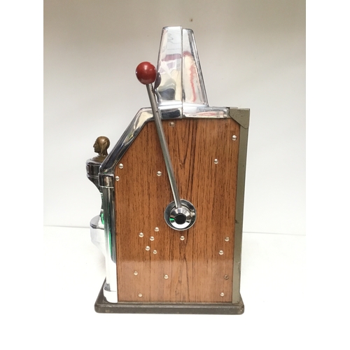 1405B - The Governor one armed bandit by Jennings with slot for 5p and featuring a brass Indian head chief o... 
