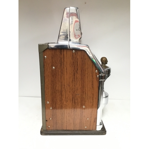 1405B - The Governor one armed bandit by Jennings with slot for 5p and featuring a brass Indian head chief o... 