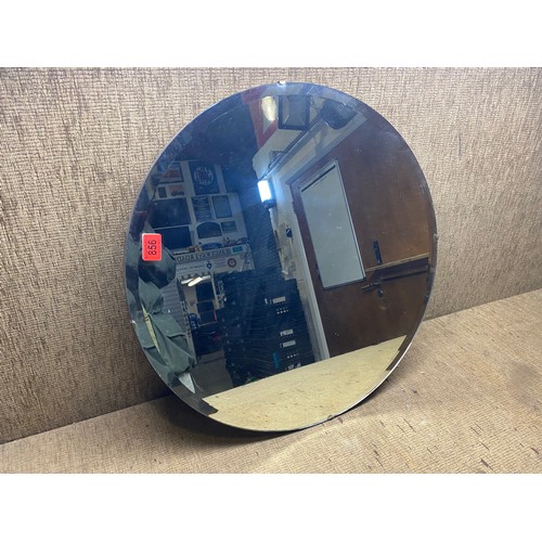 856 - circalar bevel edged mirror 62cm.