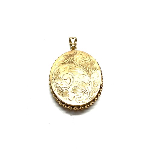 1180 - 9ct gold locket 10.5g
