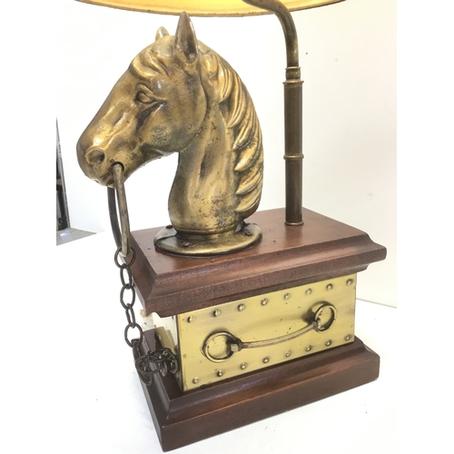 811 - Brass style horse head lamp on a wooden plinth with shade 78cm to top of shade