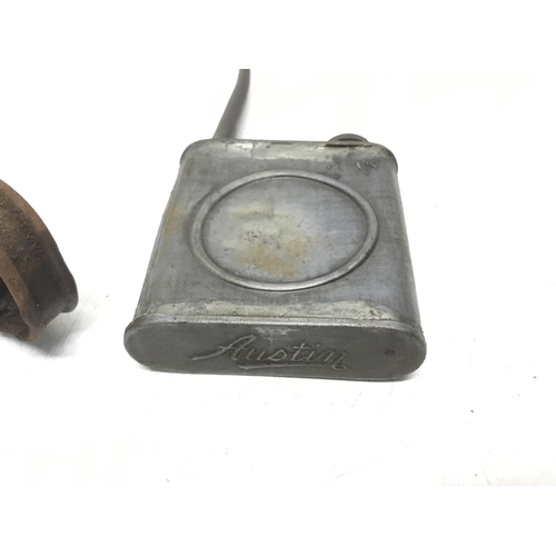 812 - Three vintage car oilers including one marked Austin