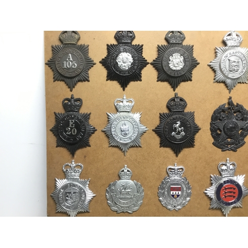 819 - A collection of 35 vintage police helmet badges including Merthyr Tydfil, Bristol and Leeds