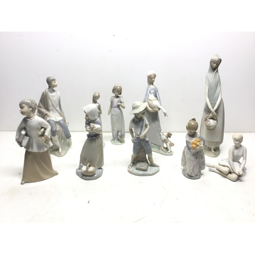 998 - A collection of Lladro and NAO (Lladro) figures plus two others
