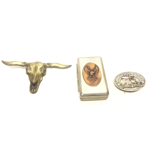 1012 - Moose head beer belt buckle, cattle head belt buckle and a Harley tobacco tin