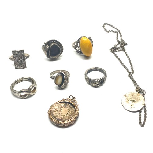 1005 - White metal rings (some test as silver), Yellow metal locket no hallmarks 3.5g (MYOMU)