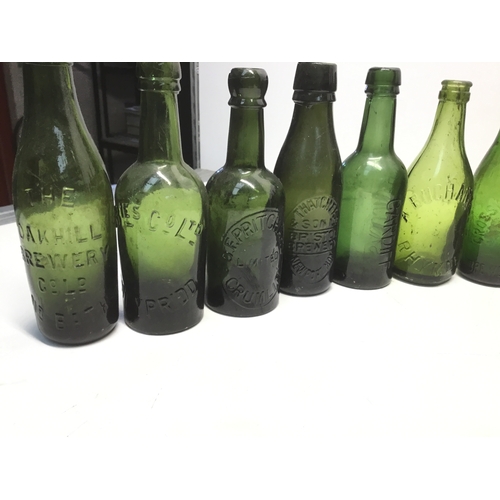 1029 - Antique advertising beer bottles including Pontypridd, Newport, Aberdare and Rhymney