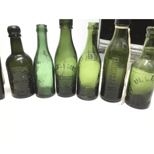 1029 - Antique advertising beer bottles including Pontypridd, Newport, Aberdare and Rhymney