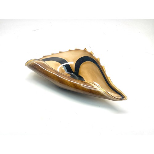 1034 - Murano-style handblown art glass conch shell bowl in amber, brown and black colours. 44cm.