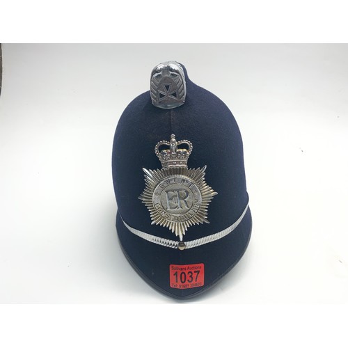 1037 - Gwent Constabulary police helmet and collection of police buttons.