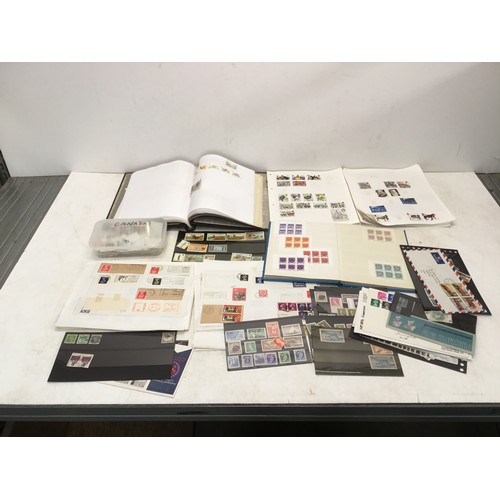 807 - Collection of stamps and stamp albums including Canada, Great Britain, jersey and gurnsey.