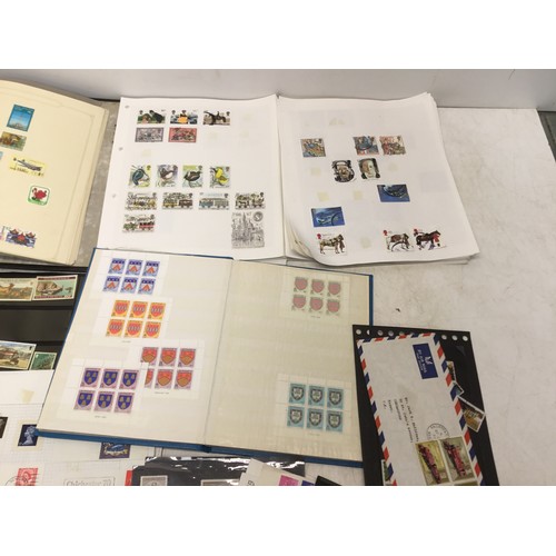 807 - Collection of stamps and stamp albums including Canada, Great Britain, jersey and gurnsey.