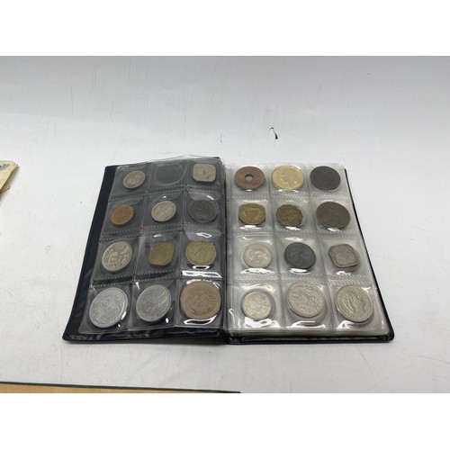 1021 - Collectible items, including World Coin Stock Full of Coins and The Victory Stamp Album with stamps.