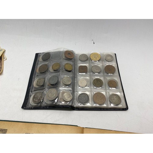 1021 - Collectible items, including World Coin Stock Full of Coins and The Victory Stamp Album with stamps.