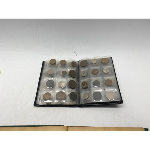 1021 - Collectible items, including World Coin Stock Full of Coins and The Victory Stamp Album with stamps.