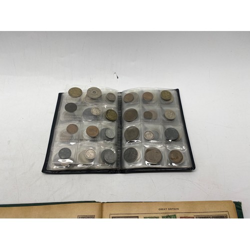 1021 - Collectible items, including World Coin Stock Full of Coins and The Victory Stamp Album with stamps.