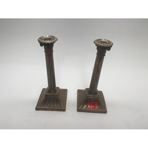 916 - a pair of silver plate on a copper Corinthian column.