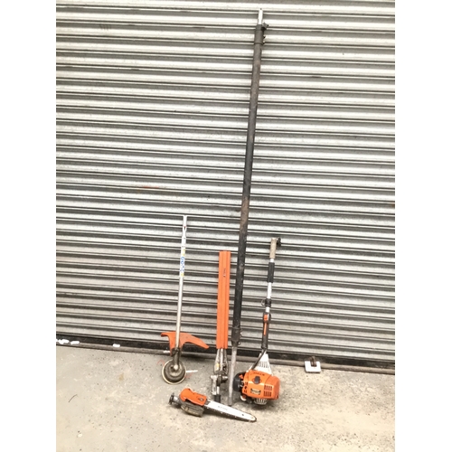 211 - Stihl petrol strimmer with chainsaw and hedge cutter attachments including extension pole