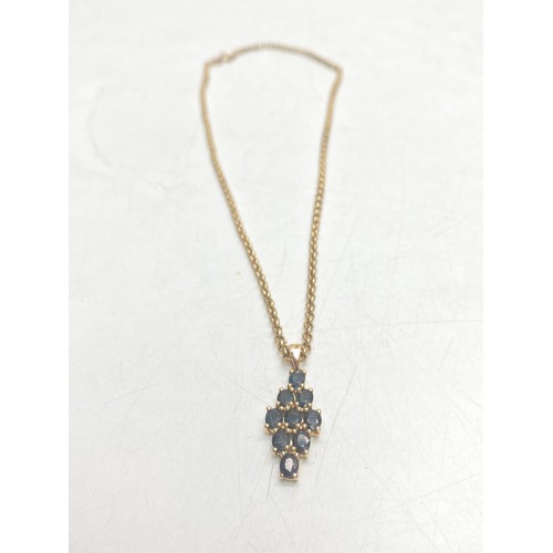 1299 - 9ct gold necklace coupled with a 10ct gold pendant 9.44g