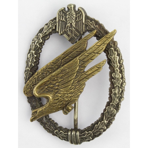 1032 - WW2 Army Paratrooper Fallschirmjager Badge 2 rivet reverse badge nicely toned complete with back pin... 