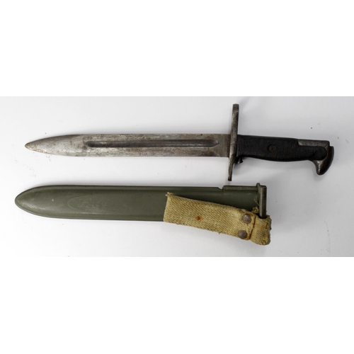 1118 - Bayonet: U.S. M1 Rifle Bayonet in its plastic scabbard with khaki frog (a/f). Service worn overall.