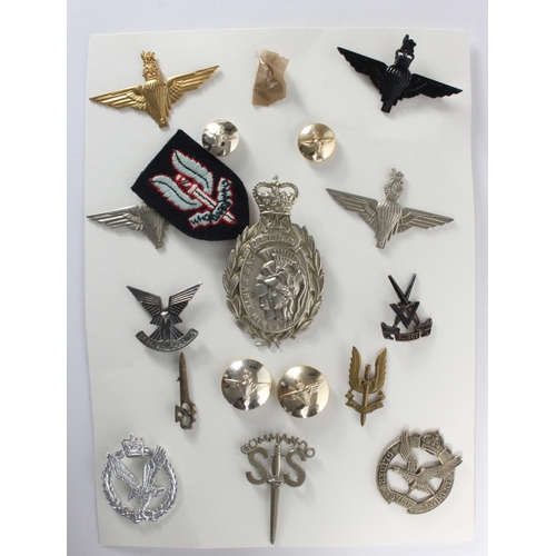 354 - Cap Badges - metal Special Forces badges, buttons, and a cloth piece.  (17)