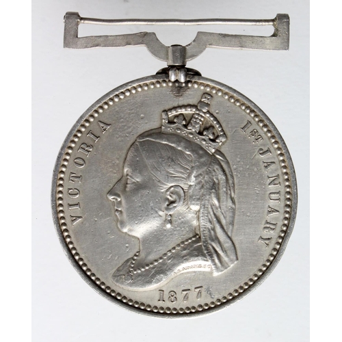 424 - Empress of India Medal 1877 in silver. Edge bump and contact marks.  GF