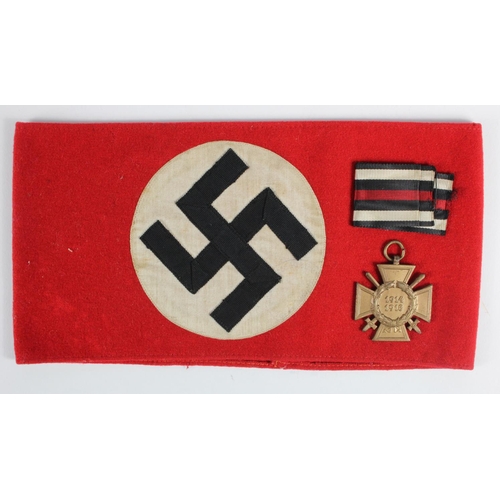 561 - German Nazi Arm Band (tiny moth hole). Plus Honour Cross with Swords maker marked.  (2)